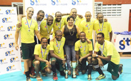 GT&T Marketing Manager Anjanie Hackett posing with the victorious men’s first division champs Hikers following their win over GCC
