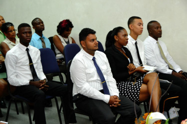 The five graduates who completed the 2015 Sworn Lands and Surveys examination. (Ministry of the Presidency photo)