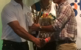 Elliot Vieira receiving his champion’s trophy award at the presentation ceremony of the CMRC last Monday.
