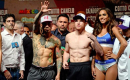 Miguel Cotto (left) and Canelo Alvarez (right) pose for a photo during weigh-ins for their upcoming WBC middleweight title fight at Mandalay Bay. Mandatory Credit: Joe Camporeale-USA TODAY Sports.