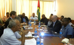 Ministers David Patterson and Noel Holder at the meeting with the team from the Netherlands yesterday (GINA photo) 