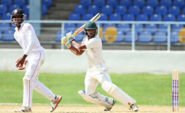 ON THE GO! Opener John Campbell cuts en route to his unbeaten 83 for Jamaica Scorpions yesterday. (Photo courtesy WICB Media)