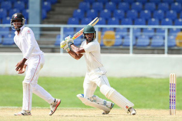 ON THE GO! Opener John Campbell cuts en route to his unbeaten 83 for Jamaica Scorpions yesterday. (Photo courtesy WICB Media)  