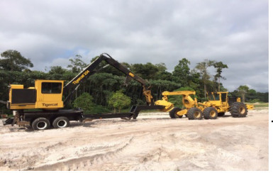 The Tigercat 234 Knuckleboom loader (left) and the Tigercat 645 Skidder