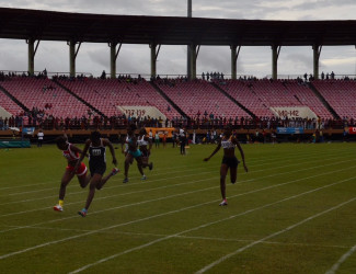  Record breaker, Kenisha Phillips, seen here winning the 100m girls under-16 final. With the win in 12.0s, Phillips became the fastest female student athlete in local history. 