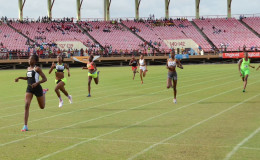 Record breaker, Kenisha Phillips storming to victory in the Girls U-16 200m final to rewrite the record books.
