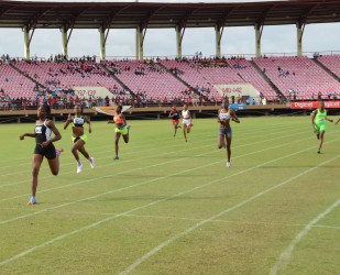 Record breaker, Kenisha Phillips storming to victory in the Girls U-16 200m final to rewrite the record books. 