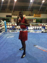 Guyana's captain, middleweight, Dennis Thomas strikes a pose after his round 2 TKO win versus Bahamian, Hubert Fernandes.