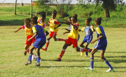 Part of the action yesterday in the 2nd Smalta /Ministry of Public Health Girls U-11 Football Championship between North Georgetown and St. Pius at the Ministry of Education ground