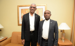 President David Granger (left) and Guyana’s Foreign Minister Carl Greenidge at the Radisson  Golden Sands  (GINA photo)