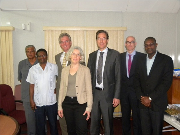 Minister of Public Infrastructure, David Patterson (right) with (left to right) Head of Task Force, Major General (Retired) Joe Singh; CEO of the NDIA, Fredrick Flatts; Ambassador Ernst Noorman; DRR member, Judith Klostermann; DRR Team Leader, Rob Steijn; and DRR Member, Fokke Westebring (GINA photo)