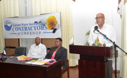 CEO, Guyana Water Inc., Dr. Richard Van-West Charles addressing the utility’s contractors’ workshop (GINA photo)