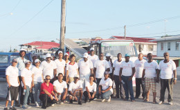 In photo: Members of the West Demerara Road Safety Association along with their accompanying traffic officer, congregated in front of the Leonara Police Station yesterday at the conclusion of the group’s awareness walk
