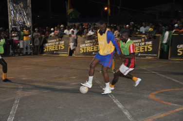  Part of the action from the earlier group stage round in the Guinness Greatest of the Streets Georgetown Championship at the National Cultural Centre tarmac on Mandela Avenue