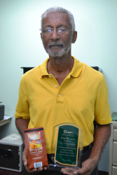 Louis Holder with his product and his GMSA Award 