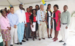 Minister of Education Dr Rupert Roopnaraine (fourth from right) flanked by staff of Cummings Park Nursery and Department of Education, Georgetown. (Ministry of Education photo)