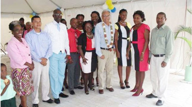 Minister of Education Dr Rupert Roopnaraine (fourth from right) flanked by staff of Cummings Park Nursery and Department of Education, Georgetown. (Ministry of Education photo)