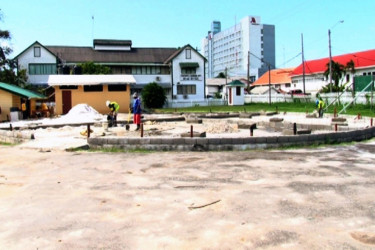 Work ongoing to create the foundation of the Umana Yana. (Government Information Agency photo)