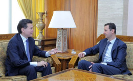 The World Chess Federation President Kirsan Ilyumzhinov is shown here (at left) in dialogue with Syrian President Bashar al-Assad in April 2012 in Damascus. President Assad had tasked the Syrian Ministry of Education to join the “Chess in Schools” project administered by FIDE. According to Ilyumzhinov, “The Syrian President plays chess very well—since his studies in London.” Two weeks ago, the US government blacklisted the FIDE president for materially assisting the Syrian government. Recently, President of the Russian Chess Federation Andrey Filatov proposed that Ilyumzhinov run for the FIFA presidency.