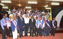 President David Granger  (seventh from right in front row) flanked by some of the men honoured by the National Association of Adventist Men’s Ministry for their longstanding service and dedication.  (Ministry of the Presidency photo)