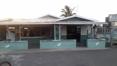 Ravo’s Pool Shop, Grocery Store and Beer Garden, located in front of Ravindra Persaud’s residence, where he was robbed at gun-point on Wednesday morning.