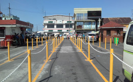 The barriers demarcating the queues at the routes 46, 41 and 45 bus park, in front of the Stabroek Market, Georgetown.
