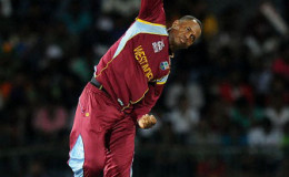 Part-time off-spinner Marlon Samuels has been banned from bowling in international cricket