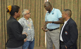 WICB director and legendary former fast bowler, Joel Garner (second from right) chats with senior counsel Anthony Astaphan during the Directors meeting while Corporate Secretary, Verlyn Faustin (left) and another WICB director, Anand Sanasie listen. (Photo courtesy WICB) 