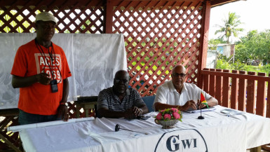 GWI Chief Executive Richard Van West-Charles (right) with Executive Director of Operations, GWI, Joseph Codette and Chairman of the Barnwell North Farmers Group, Samuel Joyce. (GWI photo)