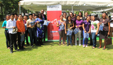 First Lady, Sandra Granger and other officials pose with the students (Ministry of the Presidency photo)