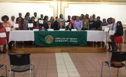 Seated from left: Director of Foreign Policy and Community Relations in the Caricom Secretariat Valerie Alleyne-Odle, Mexican Ambassador Ivan Sierra, Professor Elin Emilsson and Dr Victoria Villasenor are flanked by the participants of the Spanish as a second language programme.  