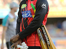 Gayle sporting his new bat (picture courtesy news corp Australia)
