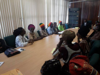 Attorney General Basil Williams at head of table with the representatives of Rastafarian organisations. (AG Chambers photo) 