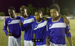 New Amsterdam United’s scorers from left to right-Jermaine Samuels, Keon Williams, Jamal Butts and Lenardo Adams posing for the camera following their 7-0 drubbing of Black Water FC in the Banks Beer Football Championship Saturday at the Number Five ground.