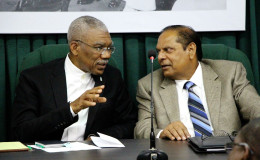 President David Granger (left) and Prime Minister Moses Nagamootoo engaged in conversation during the meeting. (Ministry of the Presidency photo).