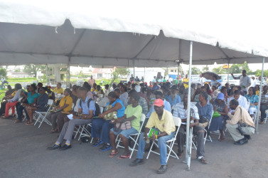 The crowd waiting in anticipation for a chance to speak to Minister of State Joseph Harmon or one of the officers. 