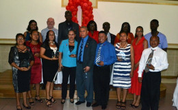 Minister of Public Health Dr. George Norton along with other dignitaries pose for group photograph with the awardees.  (GINA photo)