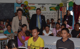 Minister of Indigenous People’s Affairs Sydney Allicock and Minister within the Ministry, Valerie Garrido-Lowe with the residents of the Amerindian hostel (GINA photo)
