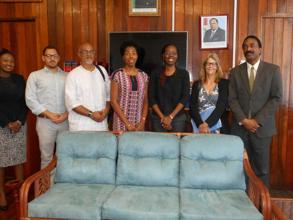 Attorney General Basil Williams (right) and the USAID team. (AG’s Chambers photo)