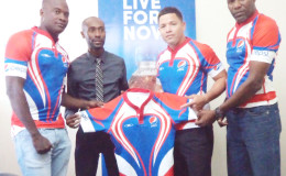 Hornets player, Blaize Bailey, Pepsi’s Brand Manager, Larry Wills, Hornets captain, Ryan Gonsalves and coach of the team Kenneth Grant-Stuart pose with the new outfits.