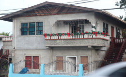 A house in the village gaily decorated for Christmas
