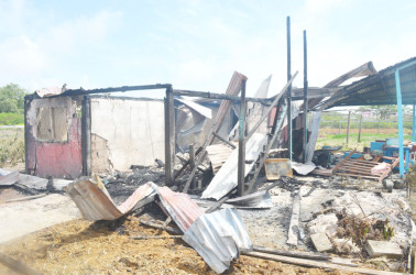 The charred remains of Anita Baichan’s home. 