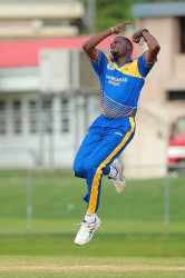 Left-arm spinner Sulieman Benn sends down a delivery during his four-wicket haul against ICC Americas on Thursday. (Photo courtesy WICB Media) 
