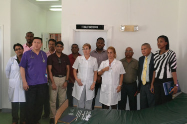 Minister of Public Health Dr. George Norton (second from right) and staff of the Leonora Hospital in Region 3 during his visit yesterday. (Government Information Agency photo)