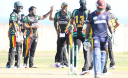 Guyana players celebrate Chadwick Walton’s departure during the Group “B” match between Guyana Jaguars and Combined Campuses & Colleges Marooners in the NAGICO Super50 Tournament yesterday at the St. Paul’s Sports Complex. Photo by WICB Media/Randy Brooks of Brooks Latouche Photography.
