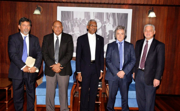 President David Granger (centre) with (from left) Repsol’s Country Manager, Giancarlo Ariza; Minister of Natural Resources,  Raphael Trotman; Repsol’s Latin America Exploration Director, Mikel Erquiaga and Exploration Manager of the Atlantic Basins, Allan Kean, at the Ministry of the Presidency yesterday. (Ministry of the Presidency photo) 