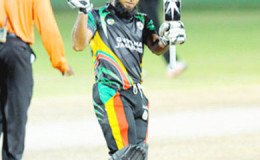 Guyana opening batsman Assad Fudadin celebrates reaching the first century by a Guyanese in this year’s NAGICO Super50 competition yesterday in a Group “B” match against the Combined Campuses & Colleges Marooners at Warner Park. (Photo by WICB Media/Randy Brooks of Brooks Latouche Photography)
See page 27
