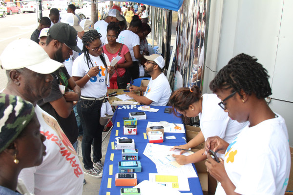 GTT employees engaging members of the public during the first of a series of Mobile Fairs that the company has planned. (Photo by Keno George)