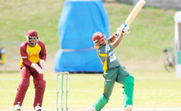 Middle order batsman Sunil Ambris hits out during his top score of 74 for Windward Islands Volcanoes during the Regional Super50 yesterday. (Photo courtesy WICB Media)