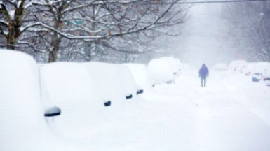 Struggling home through the snow (BBC) 